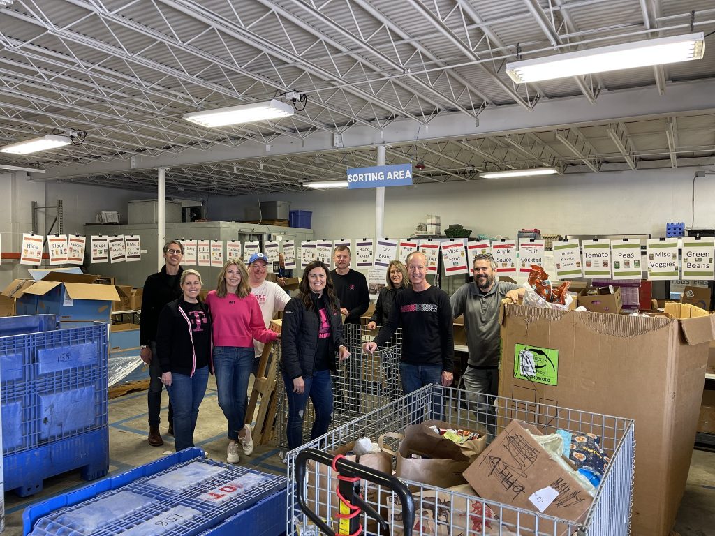 Above: T-Mobile sorted food at Hope Distribution Center which benefits our eight food pantries and Resource Bus.